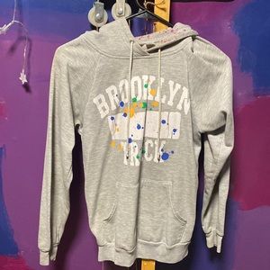 Derek heart, Small, gray with colorful dots.